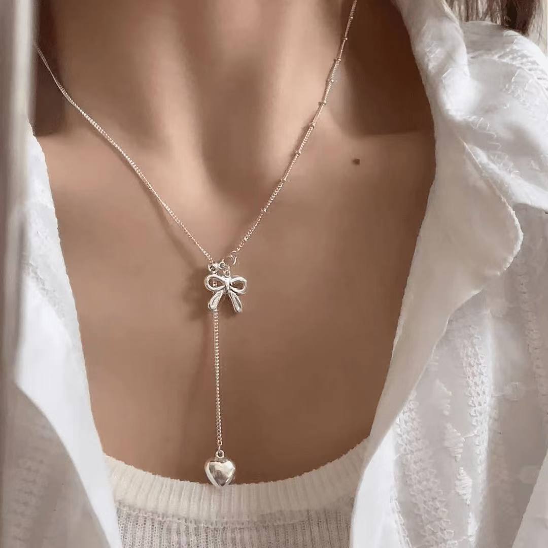 925 silver Korean style pull-out bow tassel necklace 2025 new style simple light luxury versatile niche high-end
