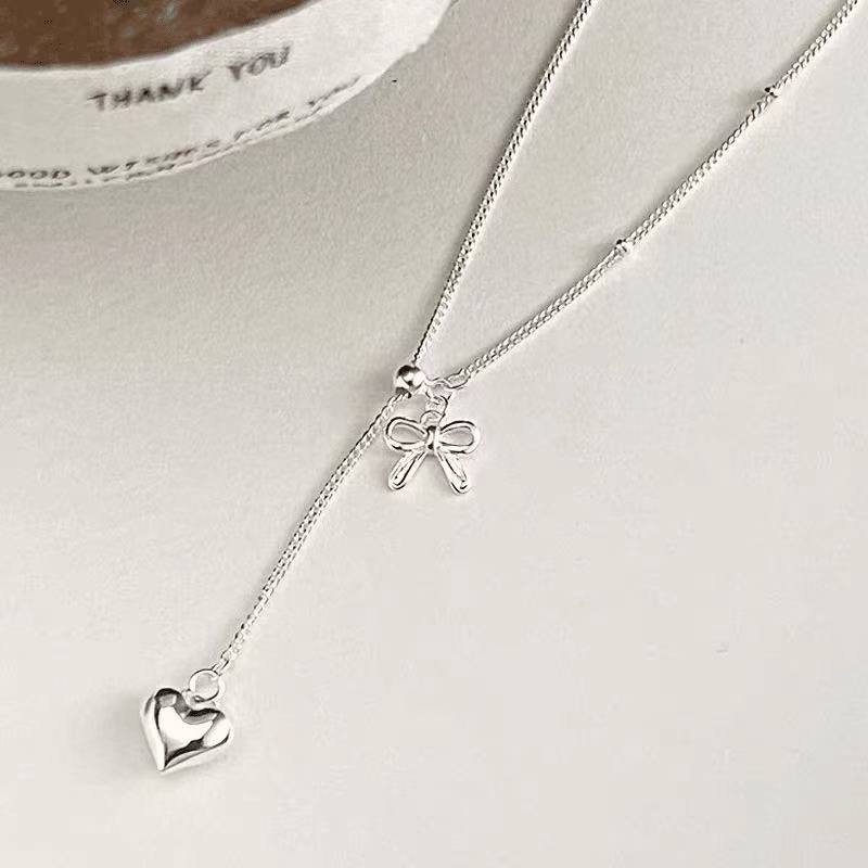 925 silver Korean style pull-out bow tassel necklace 2025 new style simple light luxury versatile niche high-end