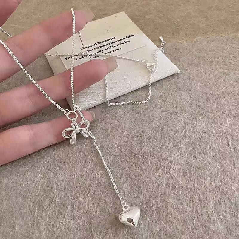 925 silver Korean style pull-out bow tassel necklace 2025 new style simple light luxury versatile niche high-end